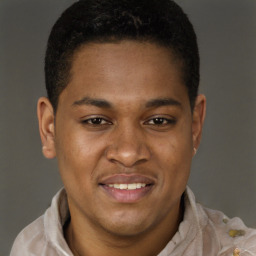 Joyful latino young-adult male with short  brown hair and brown eyes