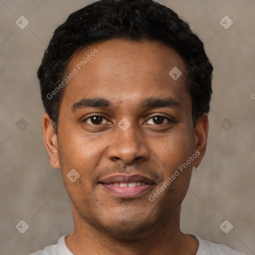 Joyful latino young-adult male with short  black hair and brown eyes