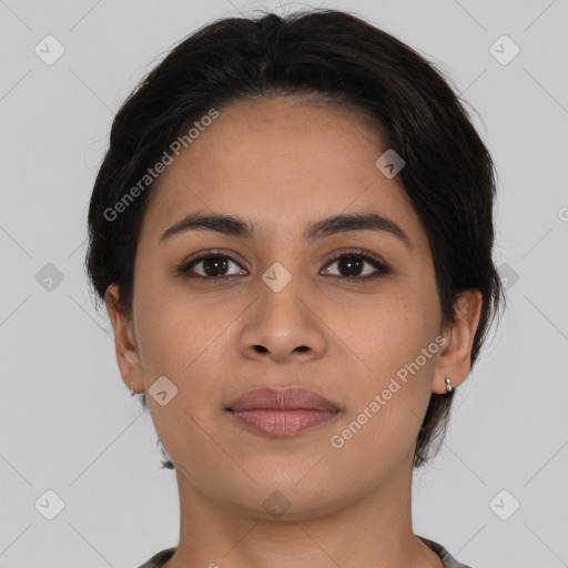 Joyful latino young-adult female with medium  brown hair and brown eyes