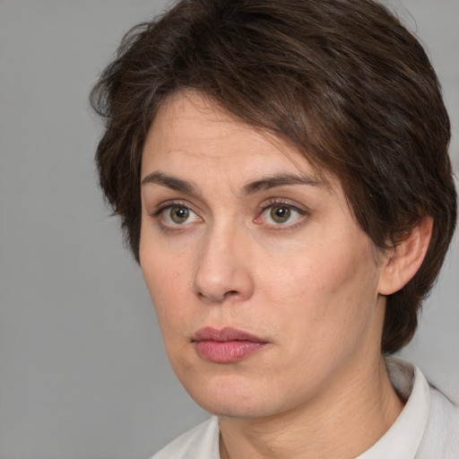 Neutral white adult female with short  brown hair and brown eyes