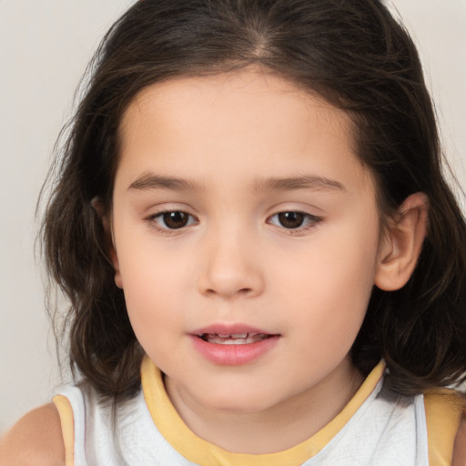 Joyful white child female with medium  brown hair and brown eyes