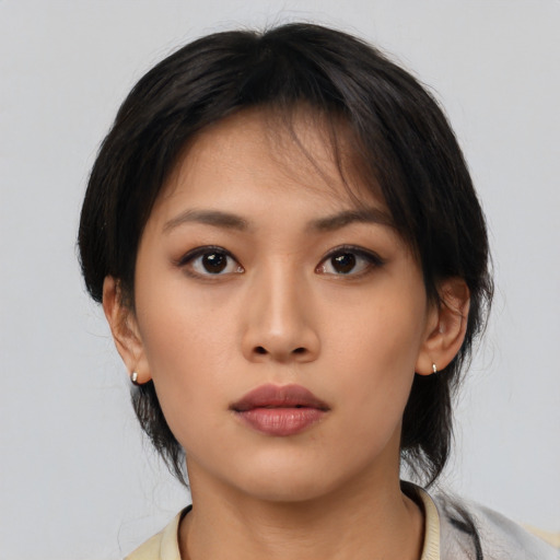 Neutral asian young-adult female with medium  black hair and brown eyes