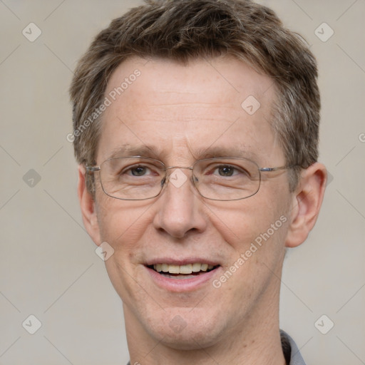 Joyful white adult male with short  brown hair and grey eyes