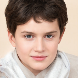 Joyful white child male with short  brown hair and brown eyes