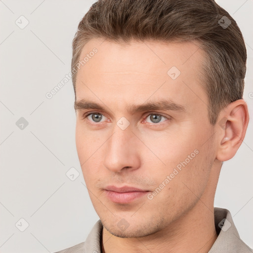 Neutral white young-adult male with short  brown hair and brown eyes