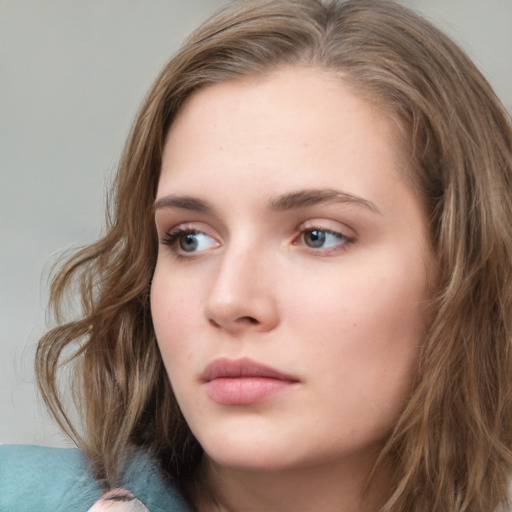 Neutral white young-adult female with medium  brown hair and green eyes