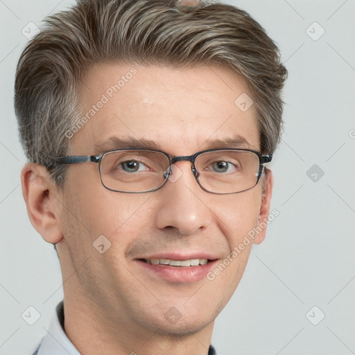 Joyful white adult male with short  brown hair and grey eyes