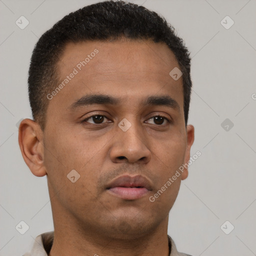 Neutral latino young-adult male with short  brown hair and brown eyes