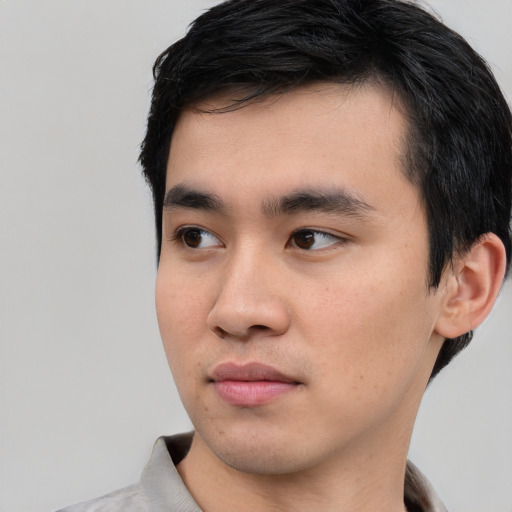 Neutral white young-adult male with short  black hair and brown eyes