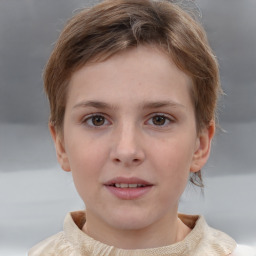 Joyful white child female with short  brown hair and grey eyes