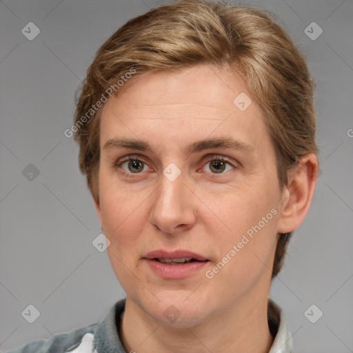 Joyful white adult female with short  brown hair and grey eyes