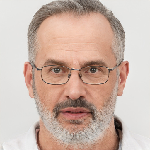 Neutral white middle-aged male with short  gray hair and brown eyes