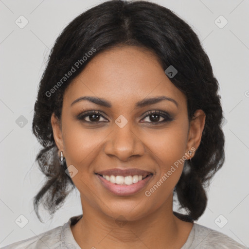 Joyful black young-adult female with medium  brown hair and brown eyes