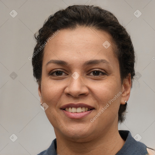 Joyful white adult female with short  brown hair and brown eyes