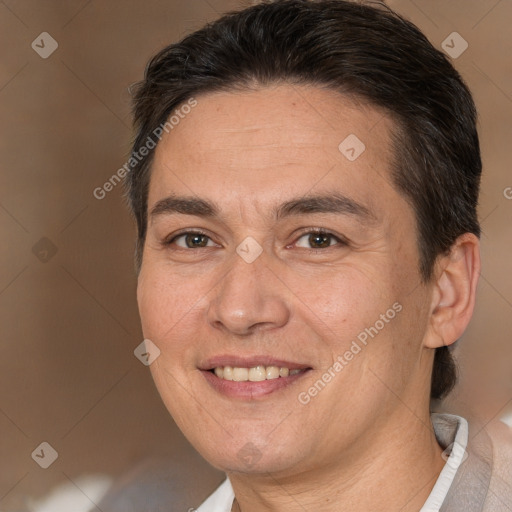 Joyful white adult male with short  brown hair and brown eyes