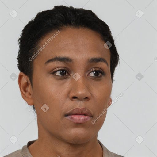 Neutral black young-adult female with short  black hair and brown eyes