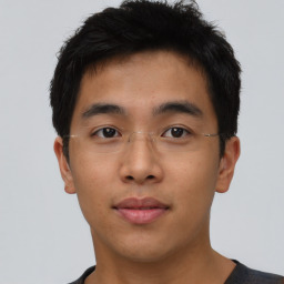 Neutral asian young-adult male with short  brown hair and brown eyes