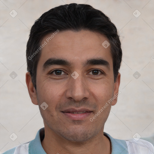 Joyful white young-adult male with short  black hair and brown eyes