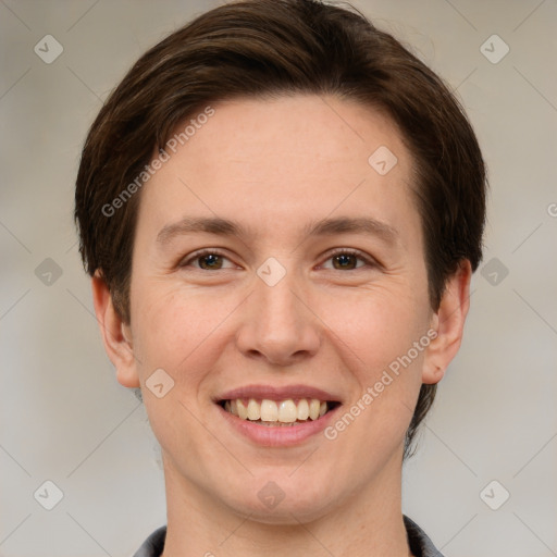 Joyful white adult female with short  brown hair and grey eyes