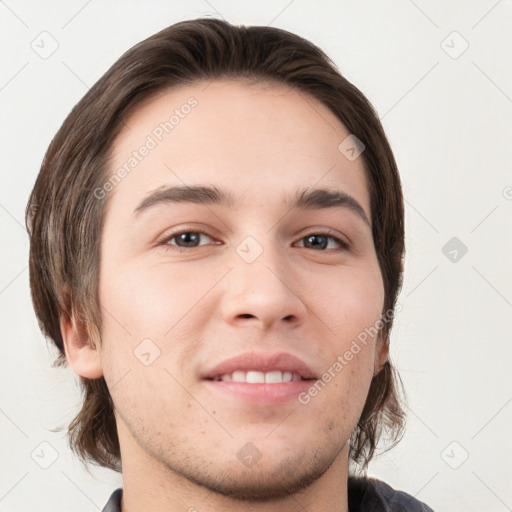 Neutral white young-adult male with short  brown hair and grey eyes