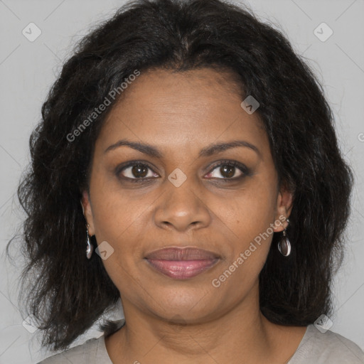 Joyful black adult female with medium  brown hair and brown eyes
