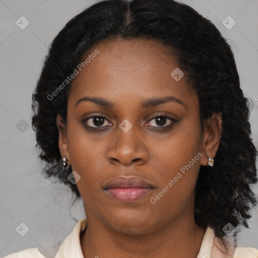 Neutral black young-adult female with medium  black hair and brown eyes