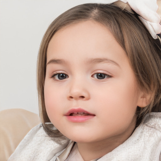 Neutral white child female with medium  brown hair and brown eyes