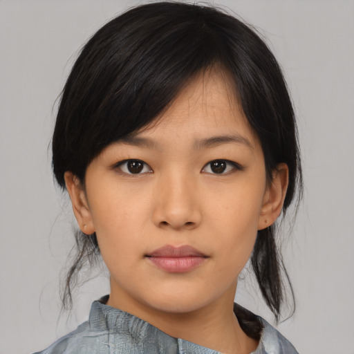 Neutral asian young-adult female with medium  black hair and brown eyes