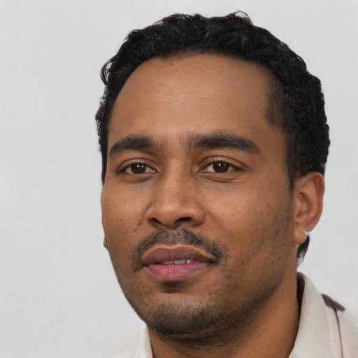 Neutral black young-adult male with short  black hair and brown eyes