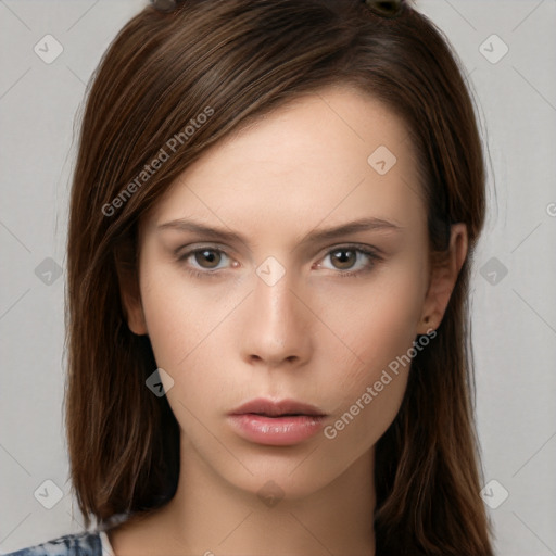 Neutral white young-adult female with long  brown hair and brown eyes