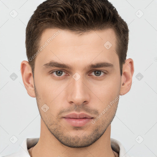 Neutral white young-adult male with short  brown hair and brown eyes