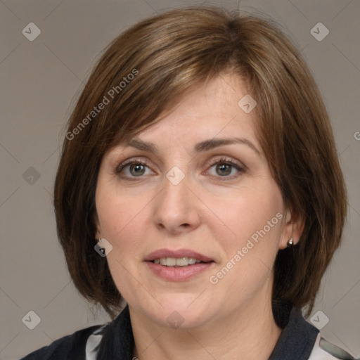 Joyful white adult female with medium  brown hair and grey eyes