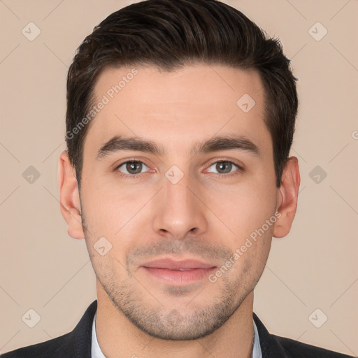 Joyful white young-adult male with short  brown hair and brown eyes