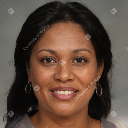 Joyful black adult female with medium  brown hair and brown eyes