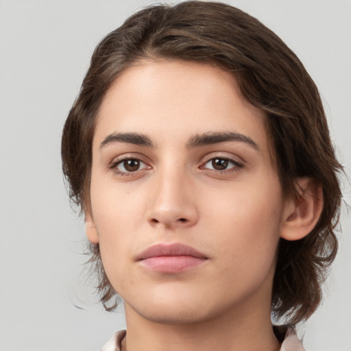 Neutral white young-adult female with medium  brown hair and brown eyes