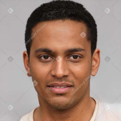 Joyful black young-adult male with short  black hair and brown eyes