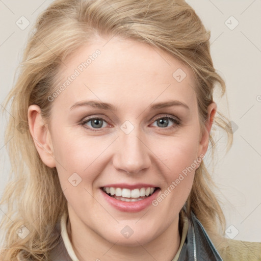 Joyful white young-adult female with medium  brown hair and blue eyes