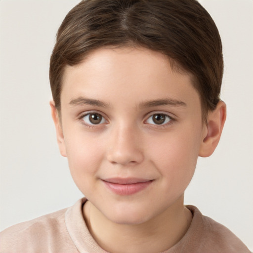 Joyful white child female with short  brown hair and brown eyes