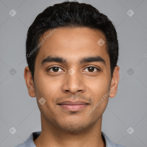 Joyful latino young-adult male with short  black hair and brown eyes
