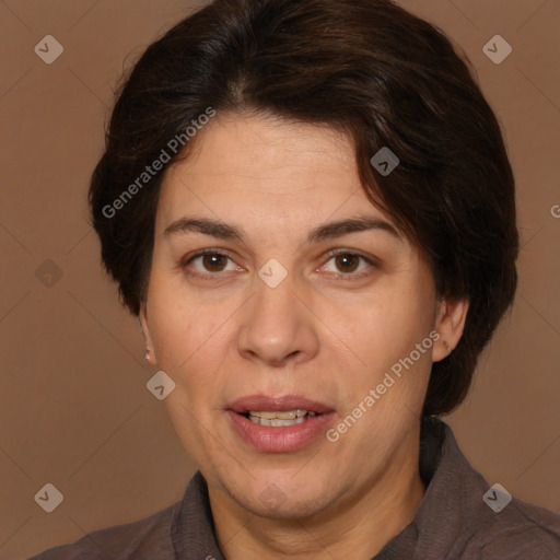 Joyful white adult female with medium  brown hair and brown eyes