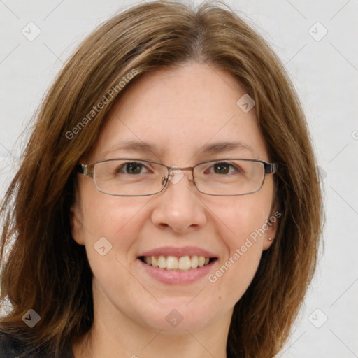 Joyful white adult female with medium  brown hair and brown eyes