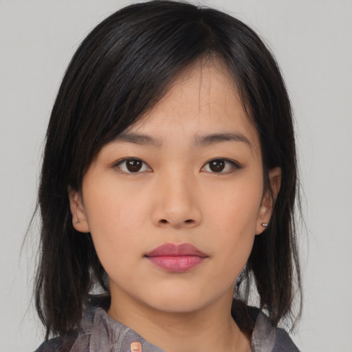 Neutral asian young-adult female with medium  black hair and brown eyes
