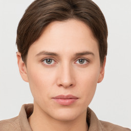 Neutral white young-adult female with short  brown hair and grey eyes