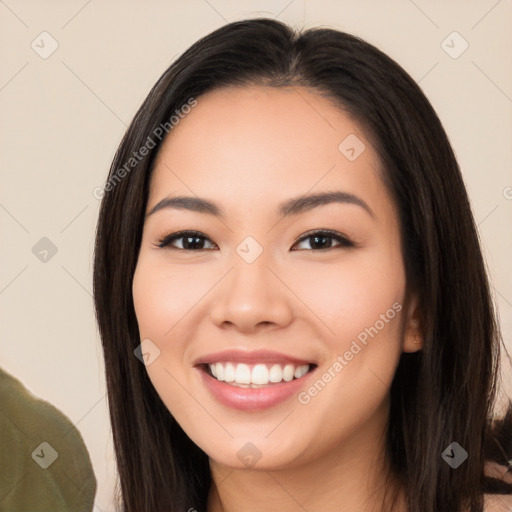 Joyful white young-adult female with long  black hair and brown eyes