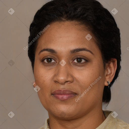 Joyful latino young-adult female with short  brown hair and brown eyes