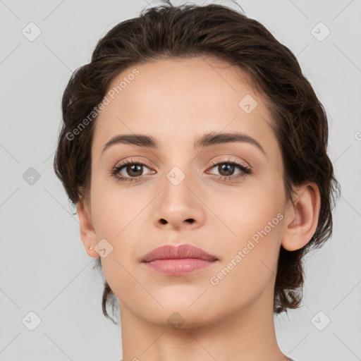 Neutral white young-adult female with medium  brown hair and brown eyes