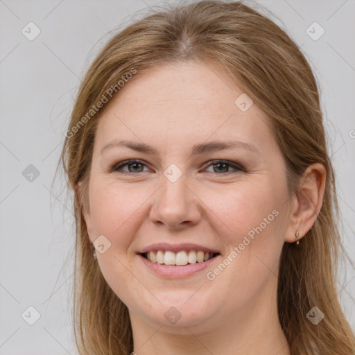 Joyful white young-adult female with long  brown hair and grey eyes