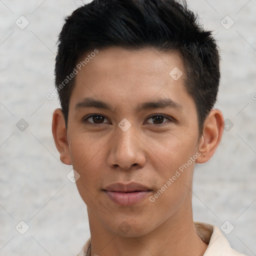 Joyful asian young-adult male with short  black hair and brown eyes