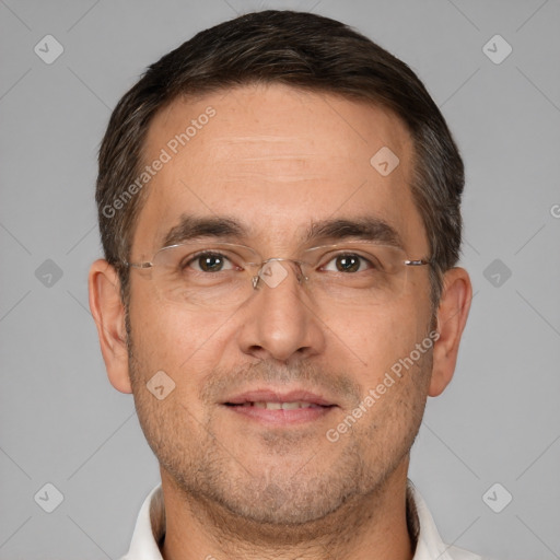 Joyful white adult male with short  brown hair and brown eyes