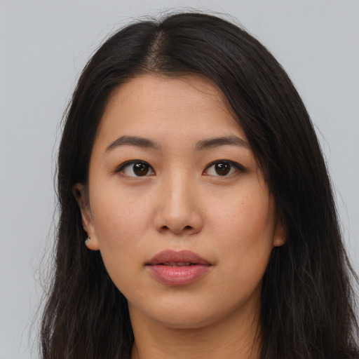 Neutral asian young-adult female with long  brown hair and brown eyes